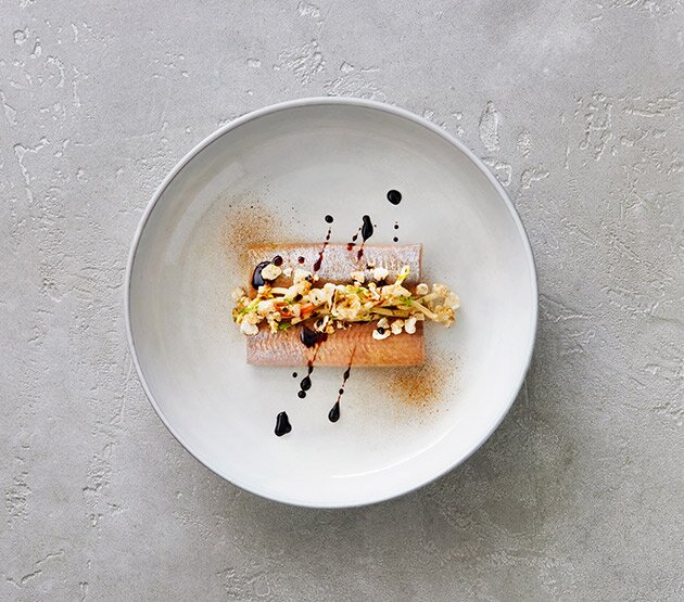 Herring with liquorice and crispy pork popcorn