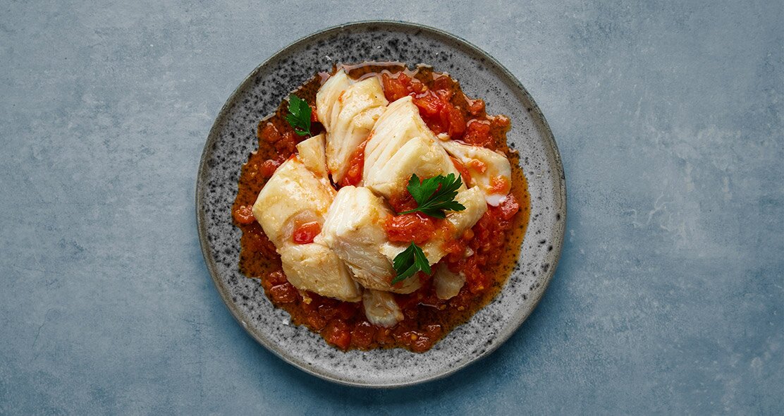 Norwegian salted cod with tomato sauce