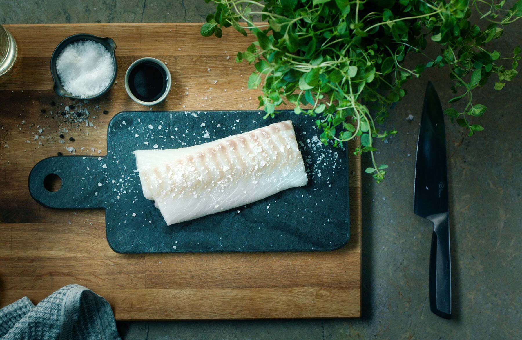 Norwegian cod fillet on chopping board
